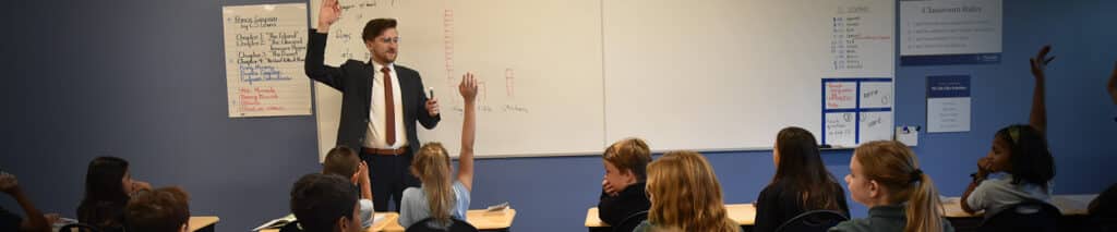 teacher and students in a classroom